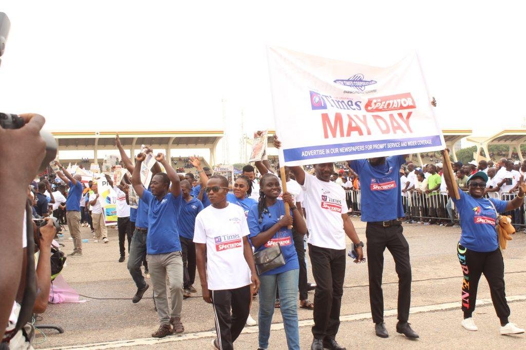 Staff of New Times Corporation marching .