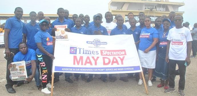 • Workers of New Times Corporation after the May Day celebration .