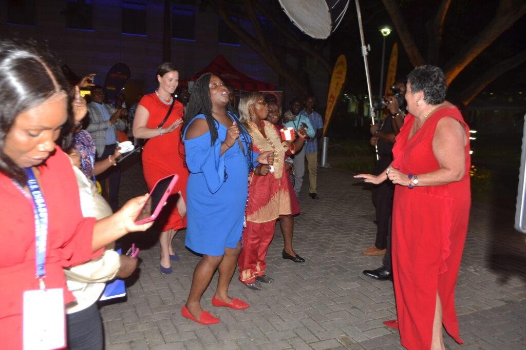 Ms Virgenia Palmer (right) dancing with some of the dignitaries at the programme Photo Victor A. Buxton