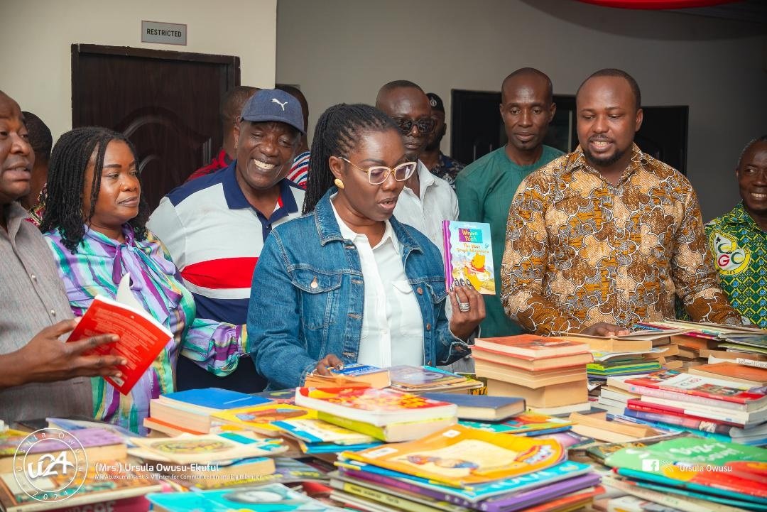 • Mrs Ursula inspecting some of the books