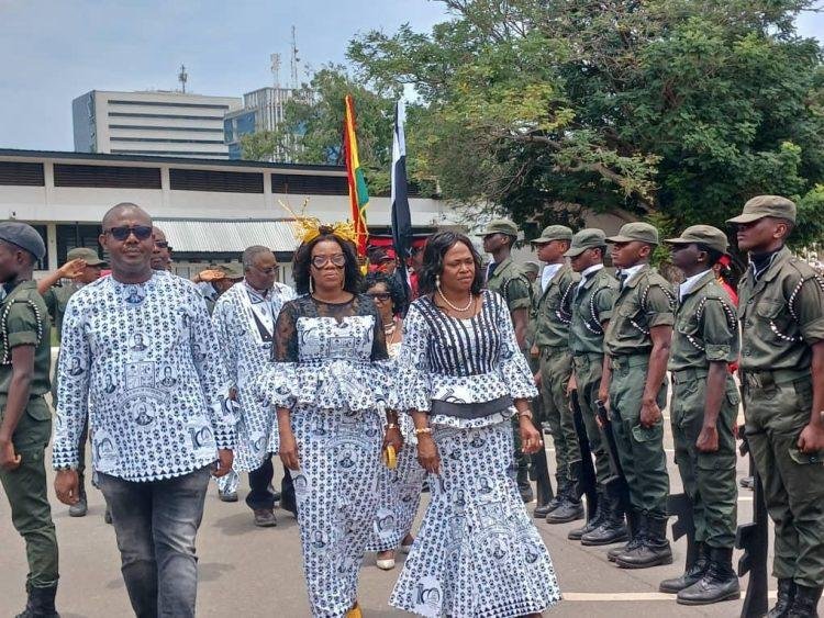 Ms Evelyn Sagbil Nabia with some Onukpai inspecting the parade