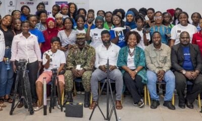 • Organisers and participants in a group picture