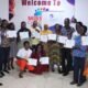 • Particpants displaying their certificates after the training