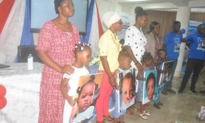 • Some of the parents with their children cured of cleft condition