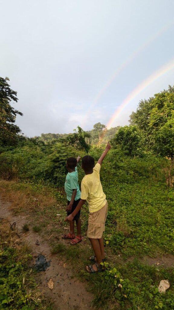 The kids exicted over the double rainbow