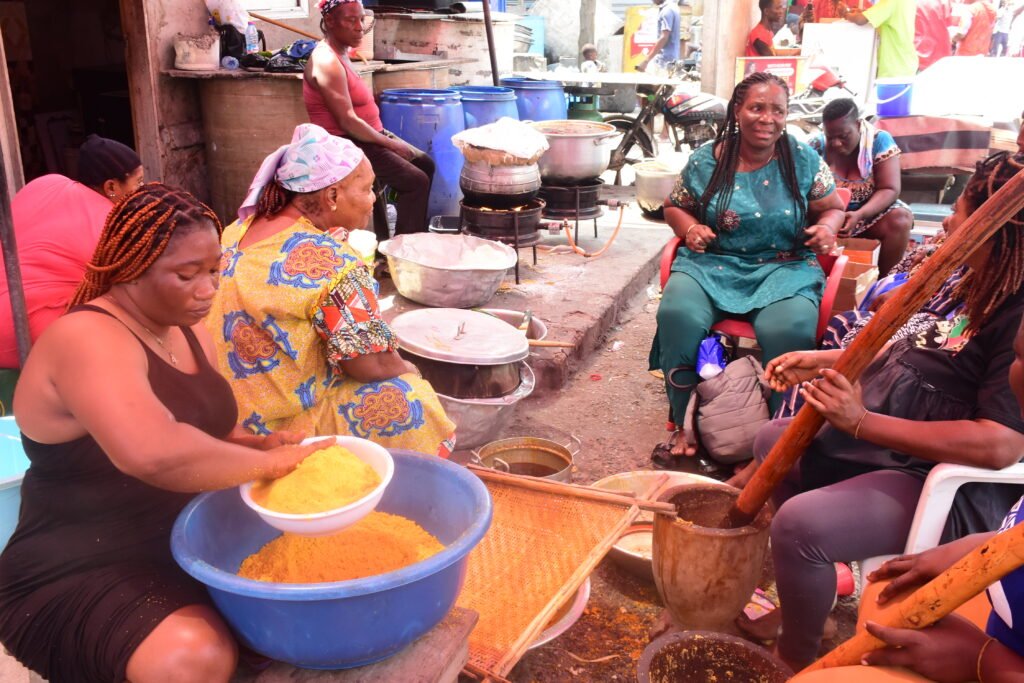The women preparing  Kpokpoi with soup