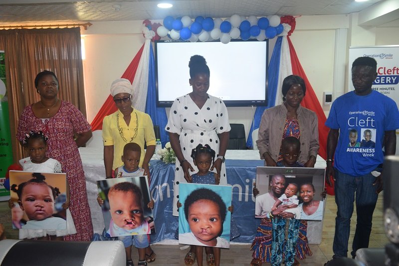 Madam Mary (second second from left) with her son at launch of cleft awareness month