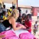 Some of the children receiving the learning material from Miss Mellanie