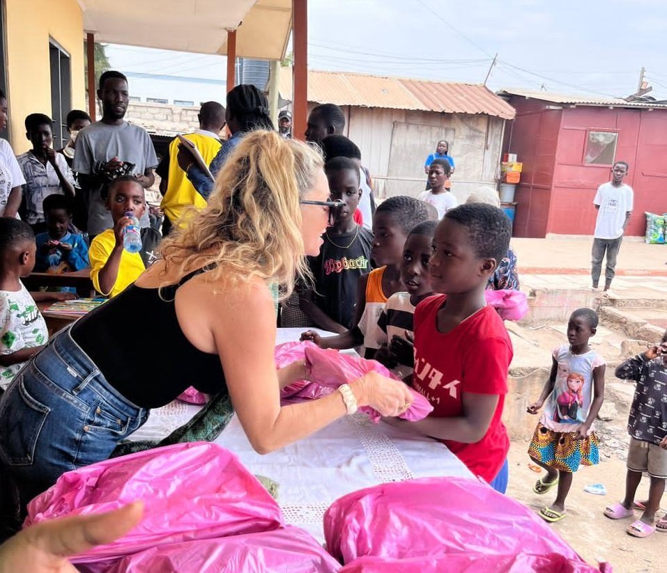 Some of the children receiving the learning material from Miss Mellanie