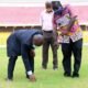 Some officials inspecting the Accra Stadium pitch