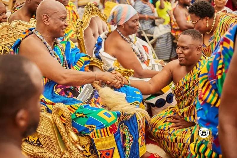 •Togbe Afede exchanging pleasantries with people
