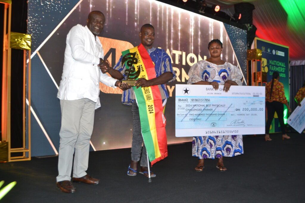 Mr. Stephen Addo,pose for the camera after receiving the National Best Physically Chanllenged Farmer Award Photo Victor A. Buxton