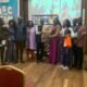 • Miss Eugenia Agyeiwaa Boadi, Founder of KIDSATHOME Educatioonal Centre in a group photograph with her family