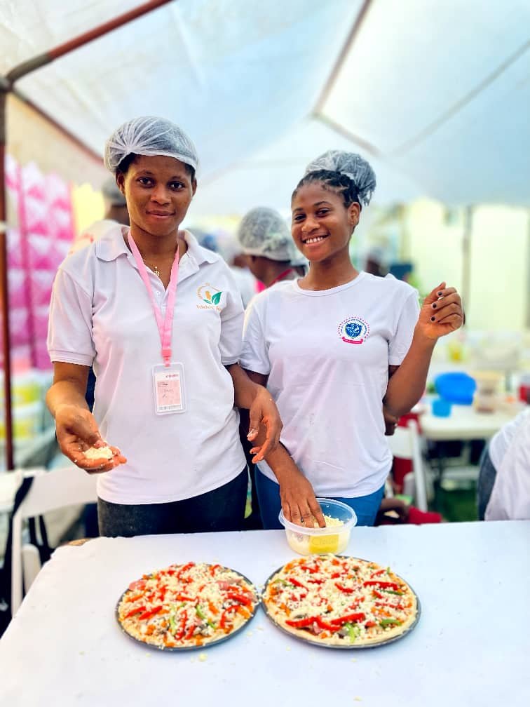 We are so happy to learn how to prepare pizza, they seem to say