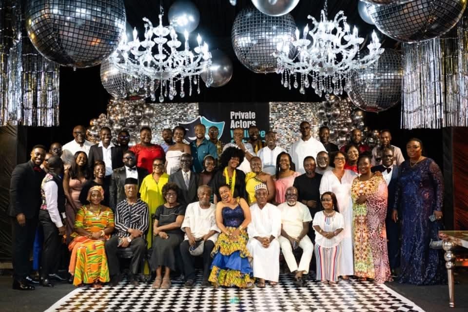 Welfare scheme actors pose for the camera