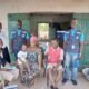 A group picture of the team and the family after successful vaccination