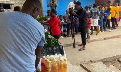 A section of the children lines up to get their meals