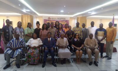 Mr Morgan (third from left) with old and new executives