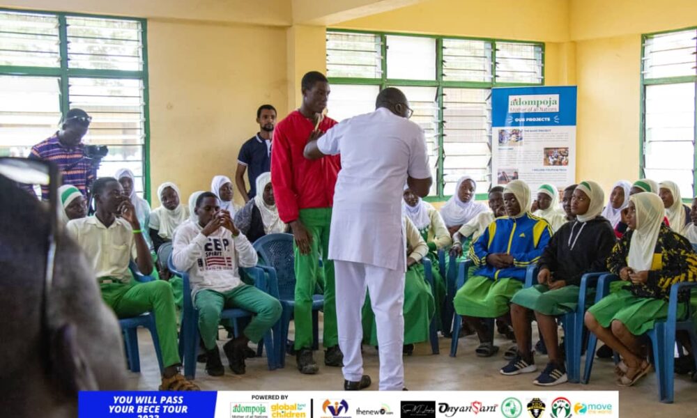 Mr Newton with some BECE candidates
