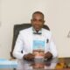 Rev. Stephen Arthur showcasing his book ‘The Journey From Under the Table’