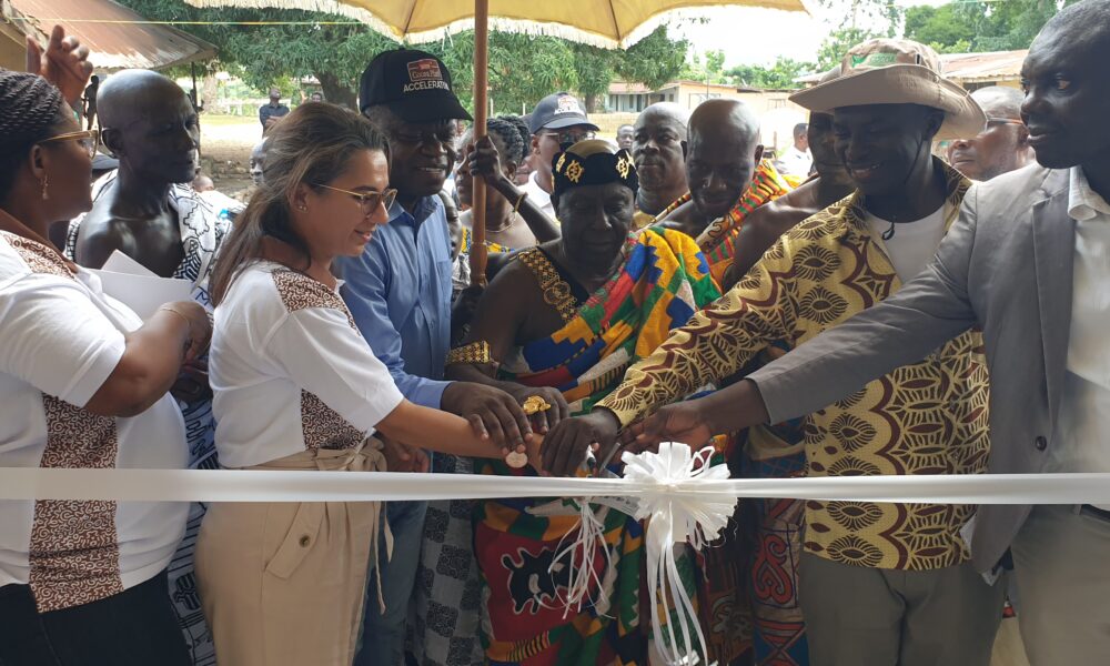 • A chief and some dignitaries cutting the tape
