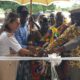 • A chief and some dignitaries cutting the tape