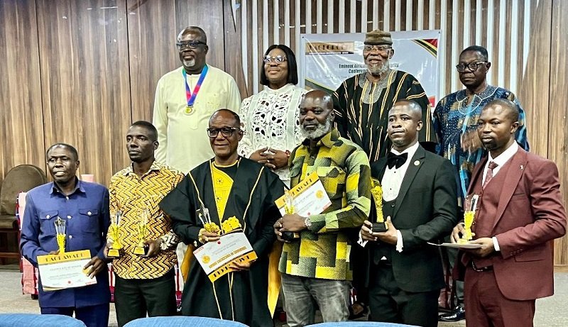 Dr Nyaho-Tamakloe (second fron right, behind) with other award winners after the event