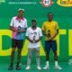 Pai (left) and Hanif (right) display their trophies after the championship