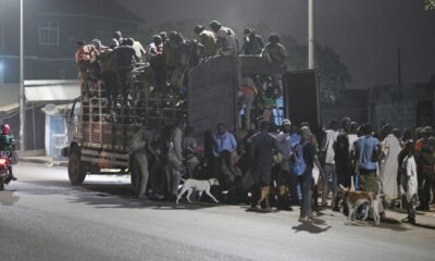 • A group of hunters returning after the day’s expedition. Photos by Geoffrey Buta