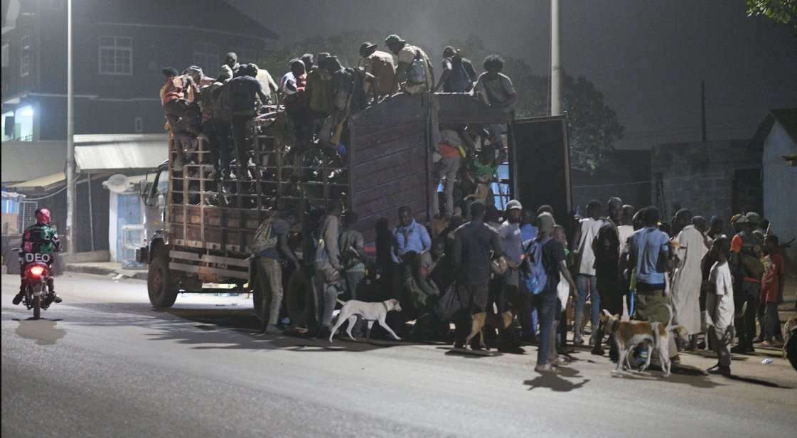 • A group of hunters returning after the day’s expedition. Photos by Geoffrey Buta