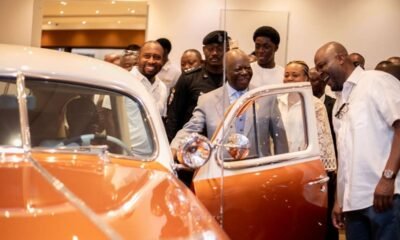 • Asantehene Otumfuo Osei Tutu II and Ibrahim Mahama inspecting one of the cars
