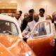 • Asantehene Otumfuo Osei Tutu II and Ibrahim Mahama inspecting one of the cars