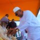 President Mahama exchanging greetings with Sheikh Osman Nuhu Sharubutu (seated) at the Independence Square