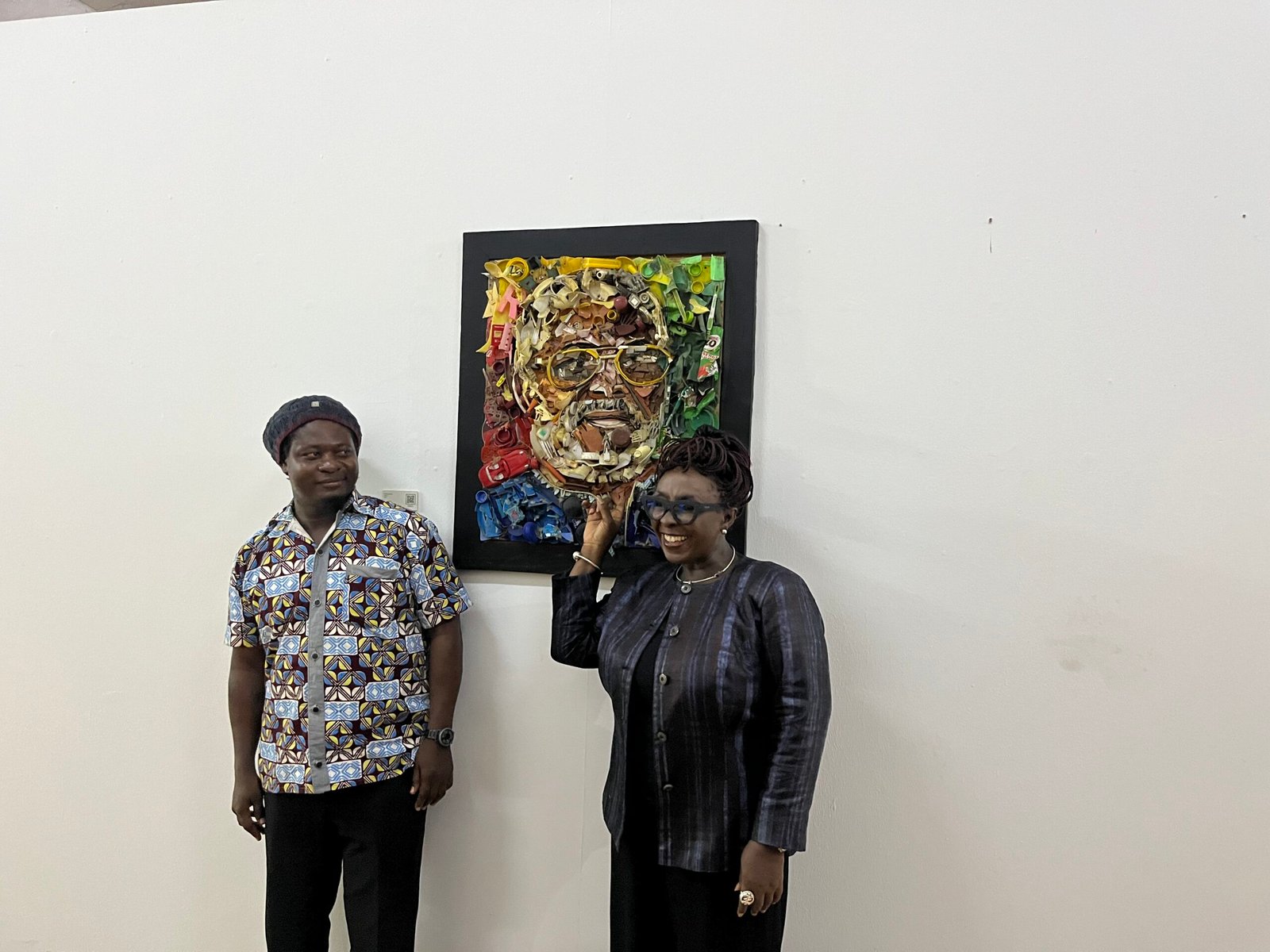 • Minister of tourism , Abla Dzifa Gomashie with one of the artists