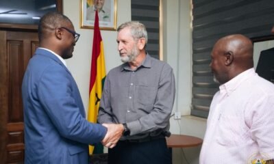 Mr Adams (left) and De Beer in a hearty chat after the meeting