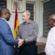 Mr Adams (left) and De Beer in a hearty chat after the meeting