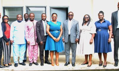 • Ms. Esther Kumi (Fifth from right) with Mr. Martin Adu-Owusu [fourth from right) Staff from NIB and NTC Management after the meeting Photo: Okai Elizabeth