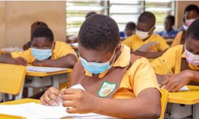 • Some school children taking their BECE exams