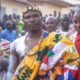 • Fiator walking through the principal streets of Awudome Tsito during his coronation