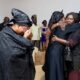 • Vice President Opoku-Agyemang consoling a family member of the late Samuel Sarpong, with Hannah Sarpong, the widow in tears