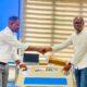 • Mr.Jacob Edmund-Acquah, President of the Fifty 50 Club (right) in a handshake with Dr. Kwadwo Anim, Executive Director of the AGA Health Foundation and a member of the Club