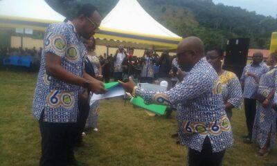 Professor Leonard Amekudzi(left) handing over documents to Dr Felix Nyarko (right),the new president while others look on