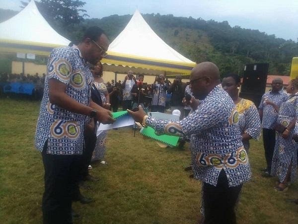 Professor Leonard Amekudzi(left) handing over documents to Dr Felix Nyarko (right),the new president while others look on