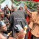 Traditional priest performing rites at the funeral grounds
