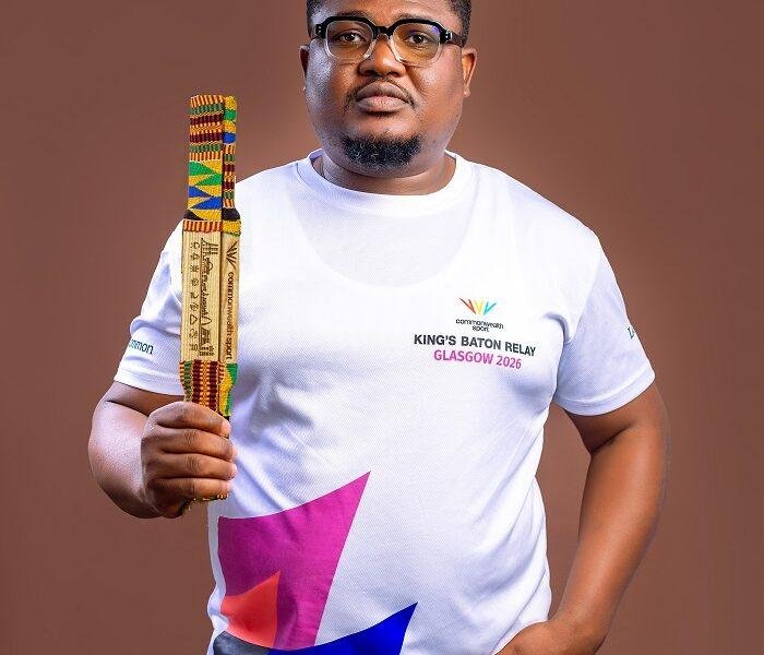 Albert Odiaba with the King’s Baton