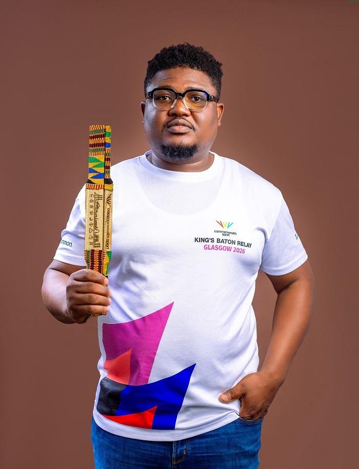 Albert Odiaba with the King’s Baton