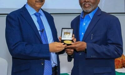 Mr Richard Akpokavie receiving his medal from Mr. Tayyab Ikram