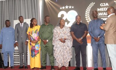 The Minister swearing in the Awards Committee of the GJA