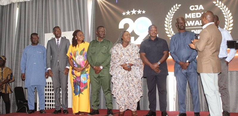 The Minister swearing in the Awards Committee of the GJA