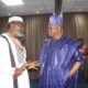 • Dr Oyekola (left) with Mr Adeoye inspecting some of the Art exhibition mounted